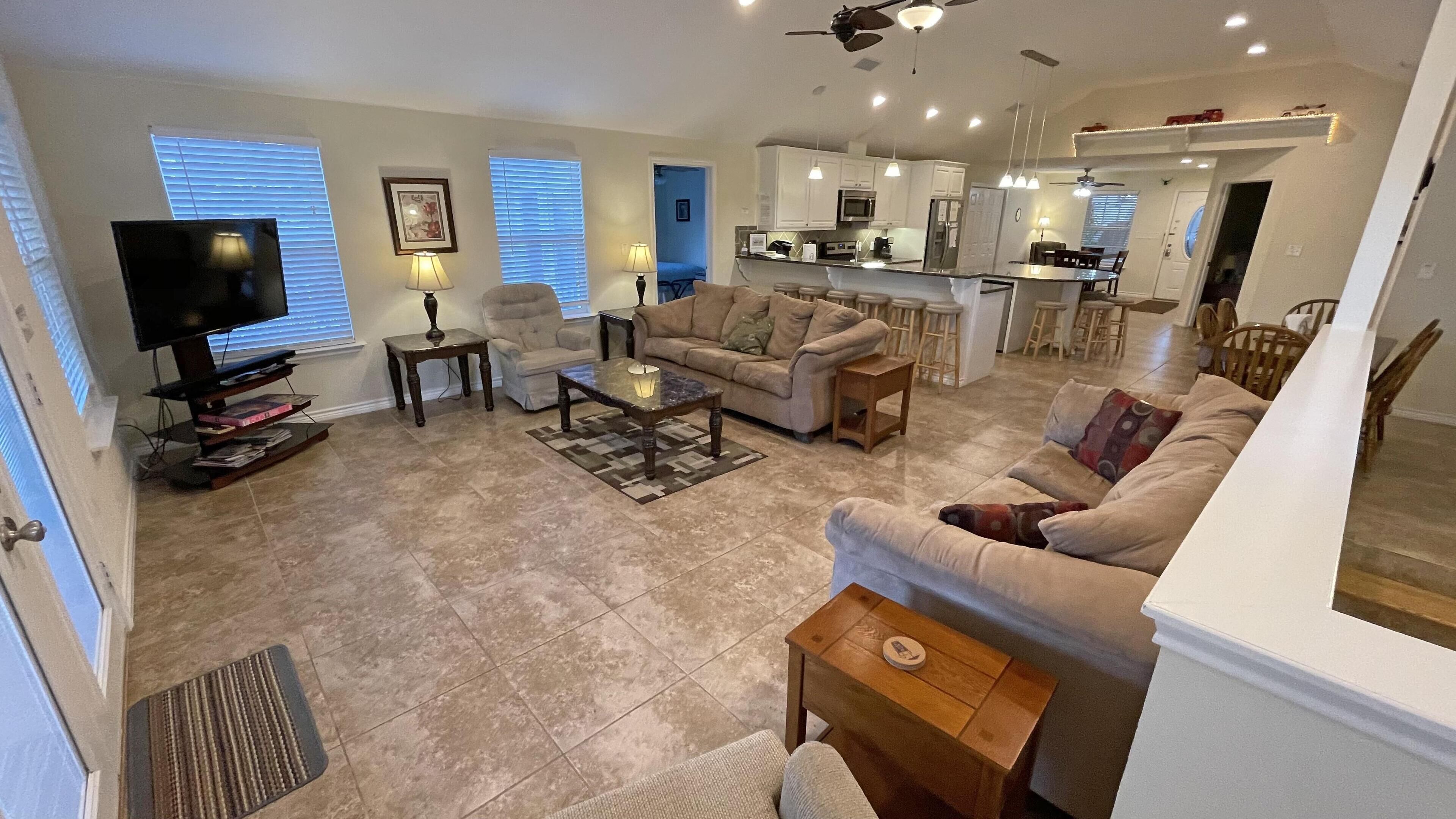 "Pat's Place" An incredible lakefront home with kayaks and decks galore.