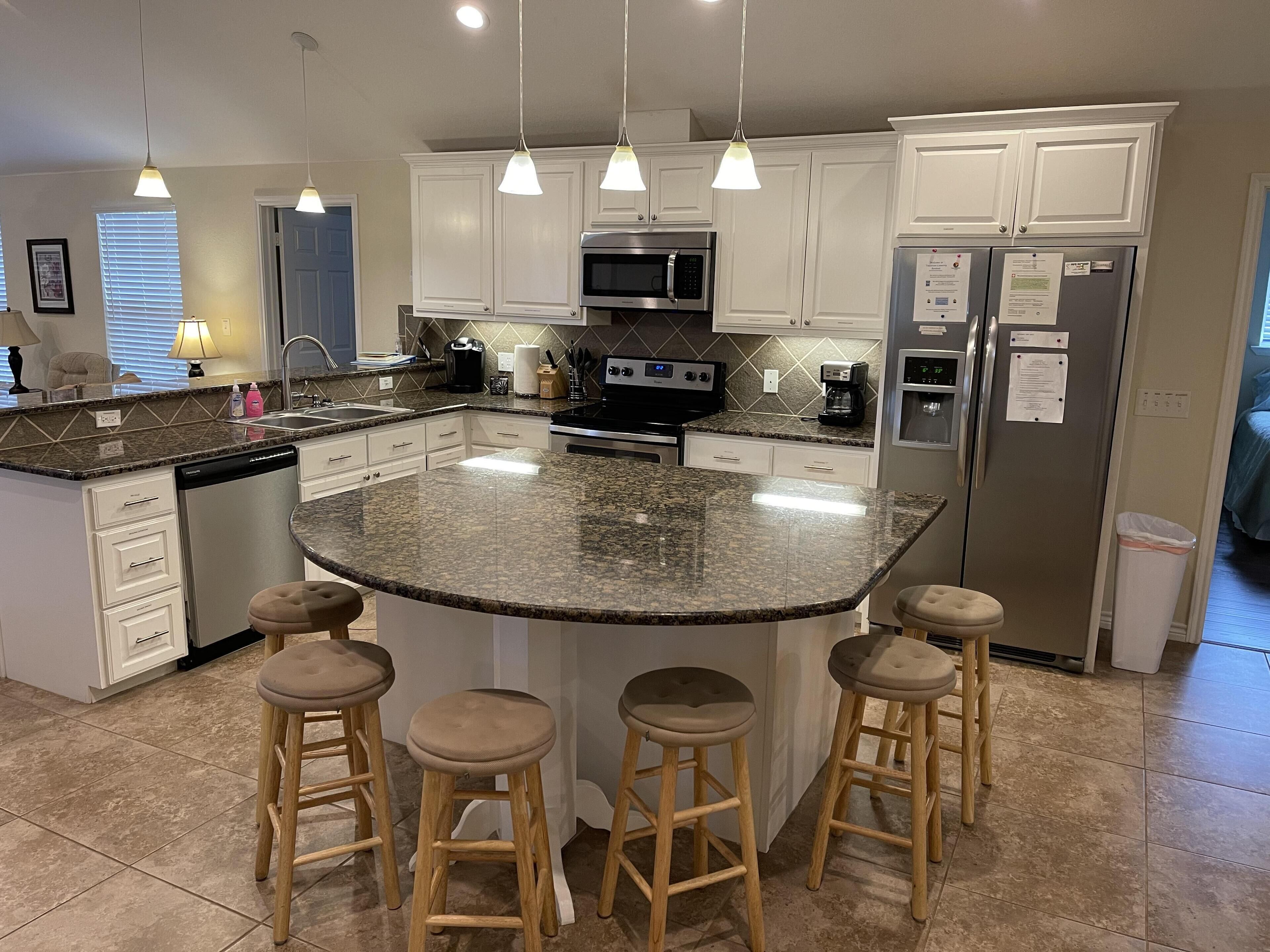 "Pat's Place" An incredible lakefront home with kayaks and decks galore.