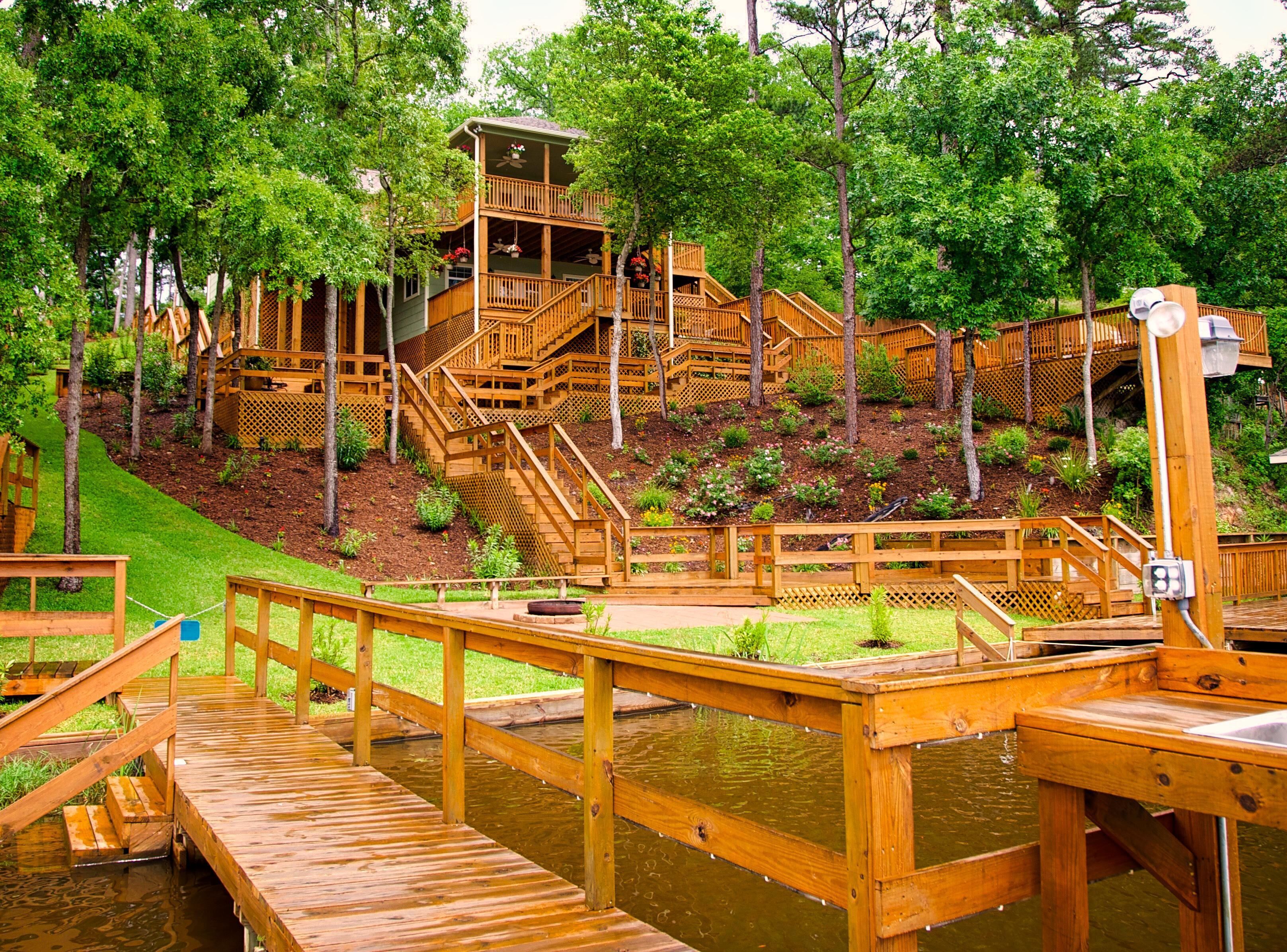 "Pat's Place" An incredible lakefront home with kayaks and decks galore.