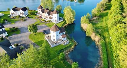 Familien- und babyfreundliche Lakeside Lodge mit Whirlpool in Wohnanlage.