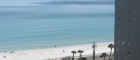 On the beach, sun-loungers