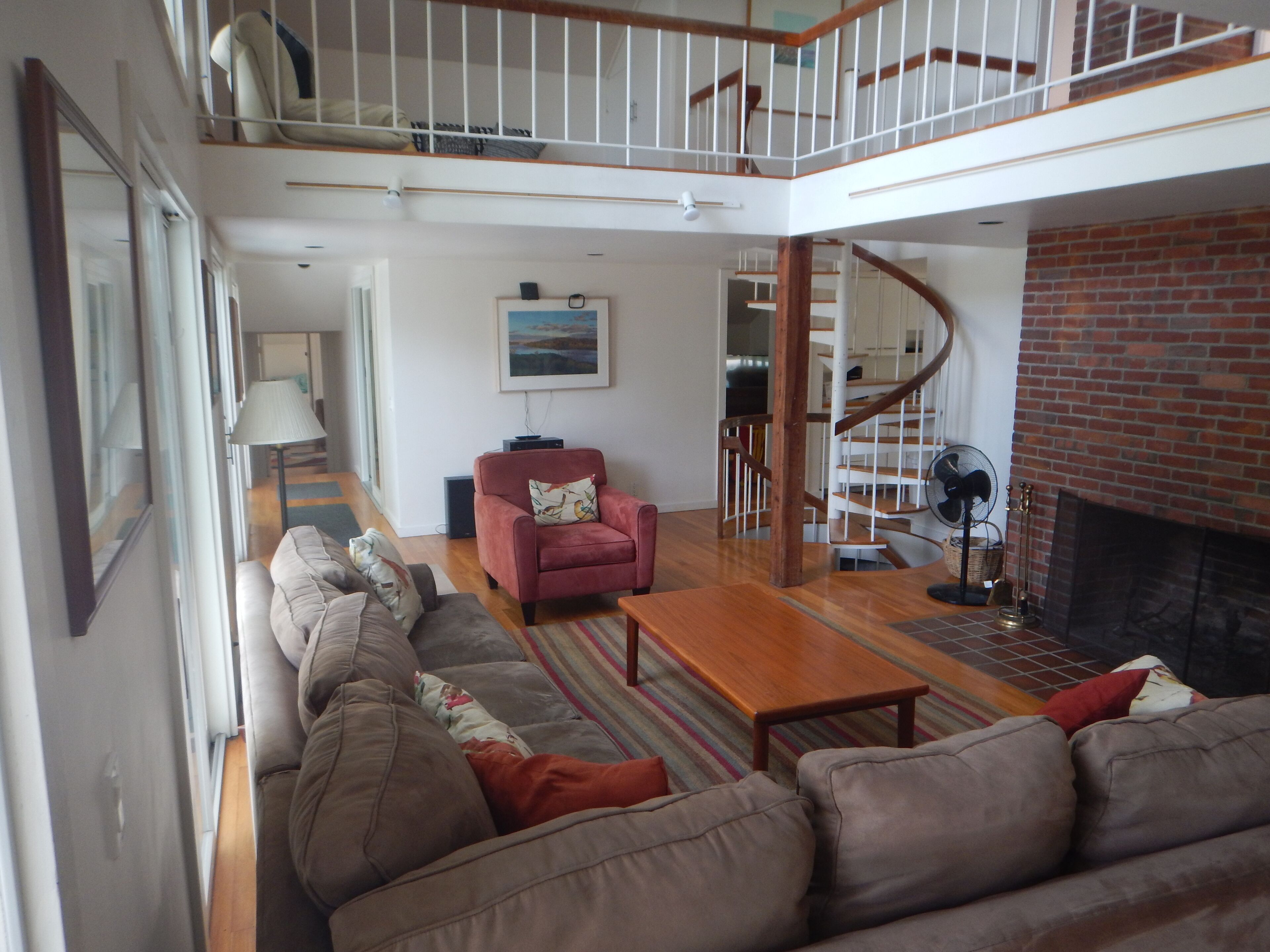 Living room  with loft space above