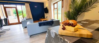 Luxury barn conversion sleeping 16 with hot tub and ensuite bedrooms