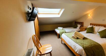 Luxury barn conversion sleeping 16 with hot tub and ensuite bedrooms