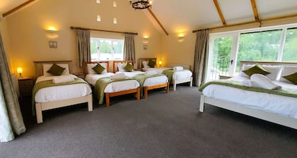 Luxury barn conversion sleeping 16 with hot tub and ensuite bedrooms