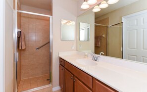 Bathtub, hair dryer, towels, soap