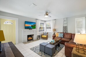 Smart TV, fireplace, books