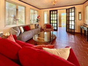 Flat-screen TV, DVD player, table tennis, books