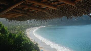 On the beach, sun loungers, beach towels