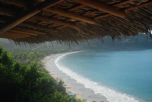 On the beach, sun loungers, beach towels