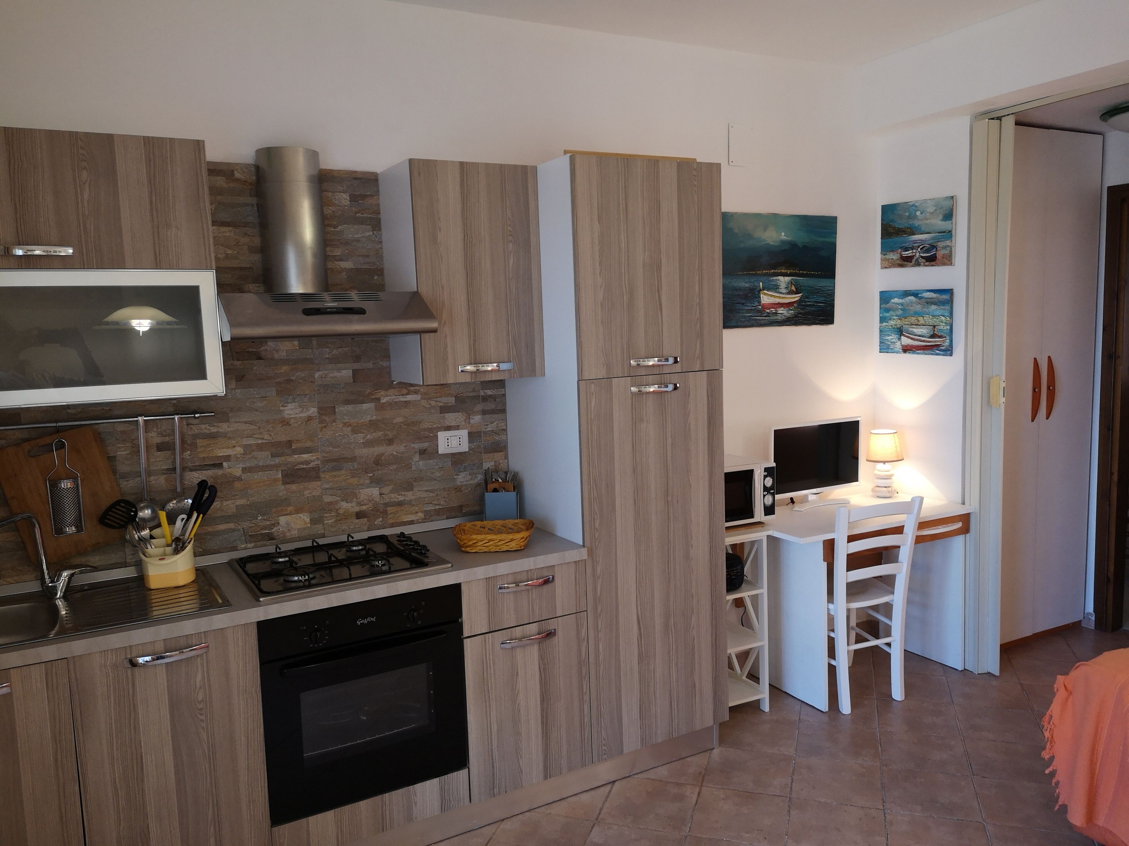 Apartment in a residence with swimming pool overlooking the sea useful for families with children