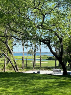 Surrounded by lush greenery and a well-maintained golf course, this serene setting offers a peaceful escape.
