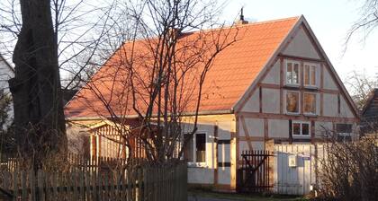 Cozy cottage in a fantastic location right on the river with a beautiful garden