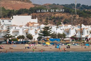 Beach nearby, sun-loungers - Lovely apartment in Alamar with pool, balcony & wi-fi. Short walk to the beach. (La Cala)