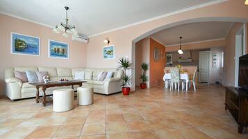 TV, DVD player, foosball, books