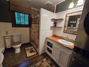Shower, hair dryer, towels, toilet paper