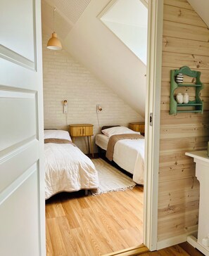 2 slaapkamers, een strijkplank/strijkijzer, gratis wifi, beddengoed