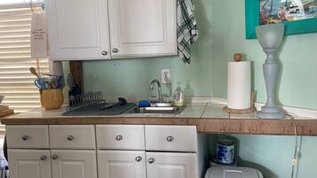 Fridge, microwave, coffee/tea maker, toaster