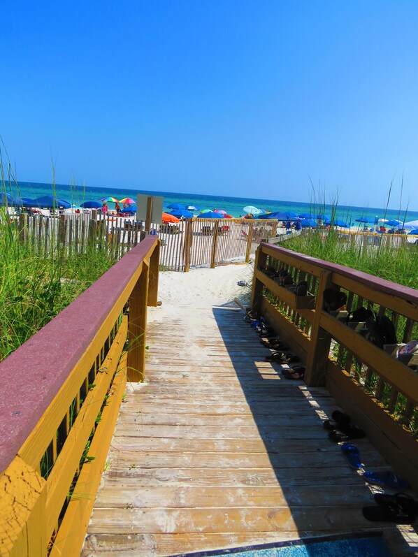 On the beach, sun loungers, beach towels