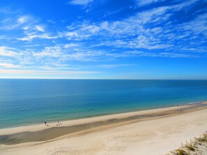 On the beach, sun-loungers, beach towels
