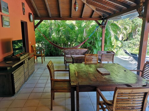 Kaz à coco Rouge, swimming pool, pearl beach at Riflet Deshaies