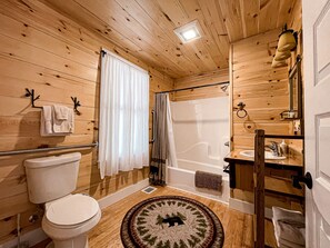 Combined shower/tub, hair dryer, towels - Longfellow a Traditional Cabin (Paul Smiths)