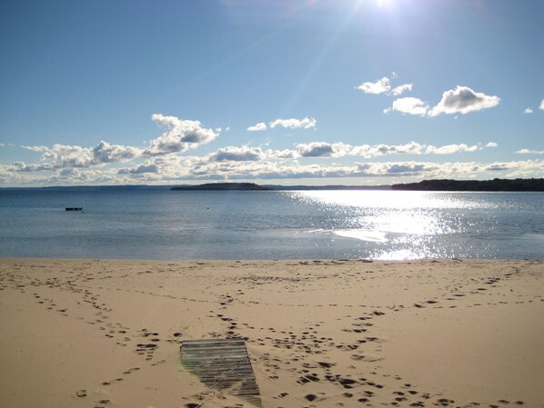 On the beach, sun-loungers, beach towels