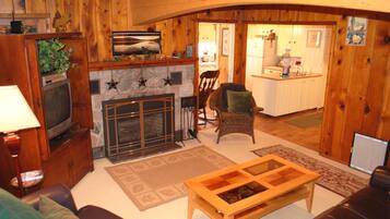 Smart TV, fireplace, DVD player, books