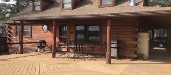 Family Friendly Lakefront Cedar Log Cabin on 2 acres at Rainbow Lake.