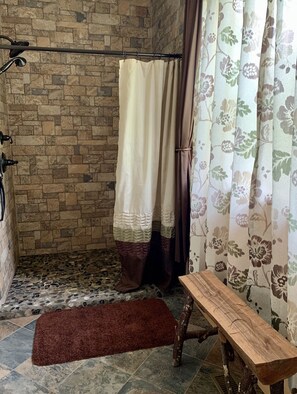 Combined shower/tub, hair dryer, towels, toilet paper