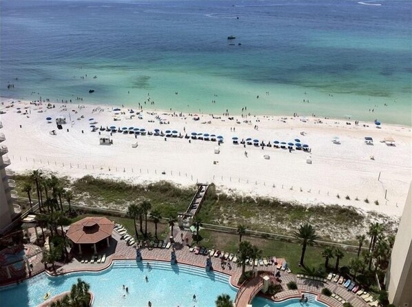 On the beach, sun-loungers, beach towels