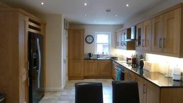 Fridge, oven, dishwasher, high chair