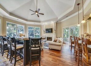 Flat-screen TV, DVD player, smart speakers