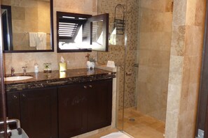 Shower, hair dryer, towels, soap