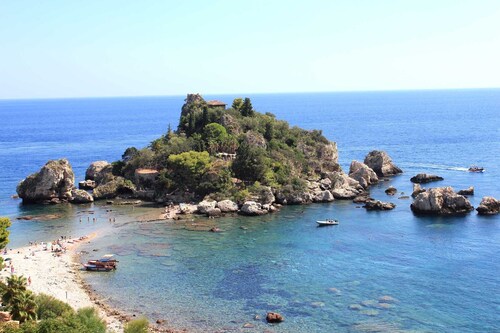 Old fisherman's house on in front of the sea and the beach of Capo d'Orlando