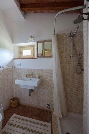 Bathtub, hair dryer, towels