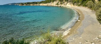 New, high-end sea view villa with chef, large pool & garden + skippered boat