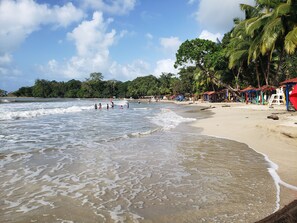 On the beach, sun loungers