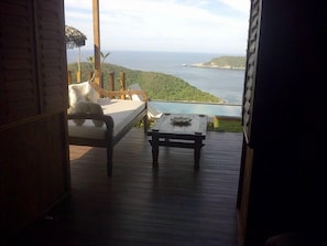 VIEW FROM BEDROOM TO THE SEA,BAY,POOL AND TERRACE