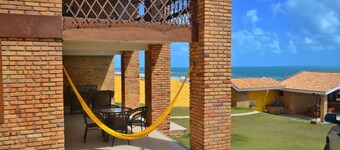 Luxurious beach house with pool, seafront terrace.