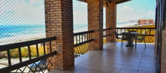 Luxurious beach house with pool, seafront terrace.