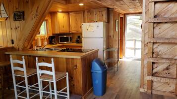 Réfrigérateur, micro-ondes, plaque de cuisson, cafetiÚre/bouilloire