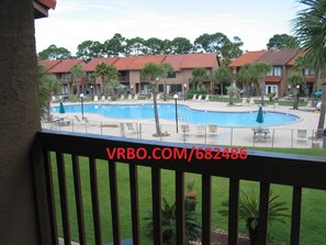 Outdoor pool, a heated pool - Grand island Blvd ~ Wi-Fi ~ just steps to the Island Pool ~ Vacations by Fayla (Panama City Beach)