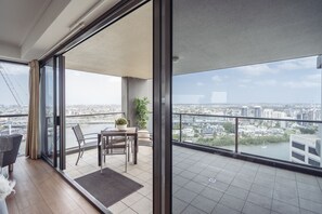 Panoramic Apartment, 2 Bedrooms, River View | Living area | Flat-screen TV, Netflix - Sky Homes on Queen (Brisbane)