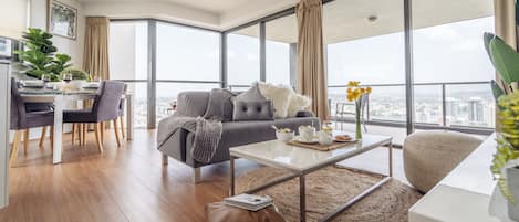 Panoramic Apartment, 2 Bedrooms, River View | Living area | Flat-screen TV, Netflix