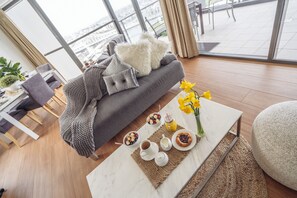 Panoramic Apartment, 2 Bedrooms, River View | Living area | Flat-screen TV, Netflix