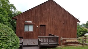 A wooden building with a sign reading "Powderhorn."