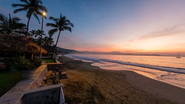 On the beach, sun loungers