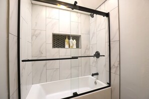 Hair dryer, towels, soap, shampoo