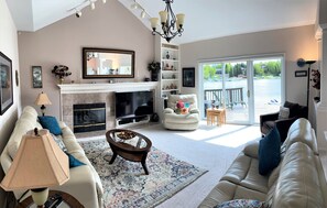 Smart TV, fireplace, DVD player, books